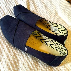 TOMS slip ons
